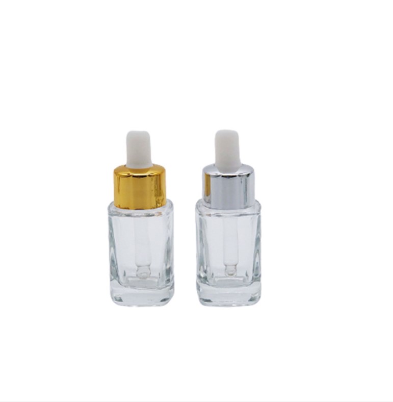 Custom logo 15ml 30ml 50ml clear square dropper bottle with gold and silver personal care production cosmetic package container