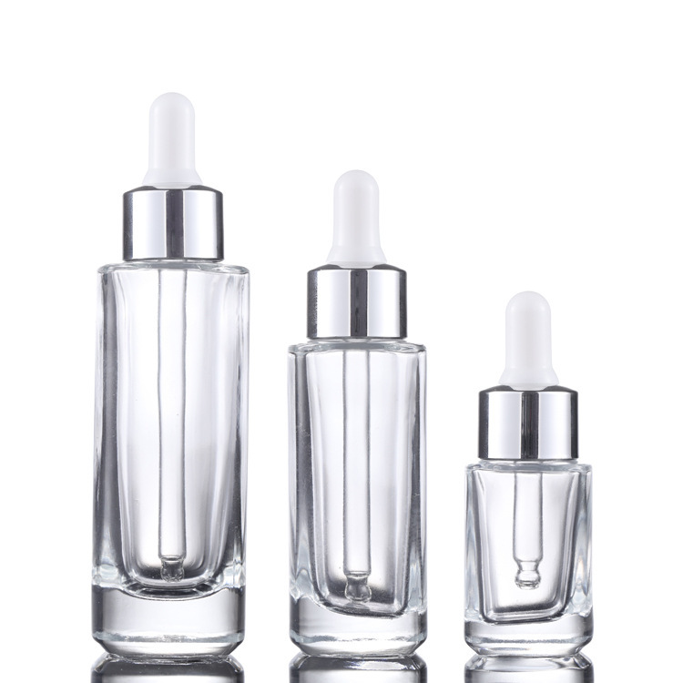 Custom logo 15ml 30ml 50ml clear square dropper bottle with gold and silver personal care production cosmetic package container