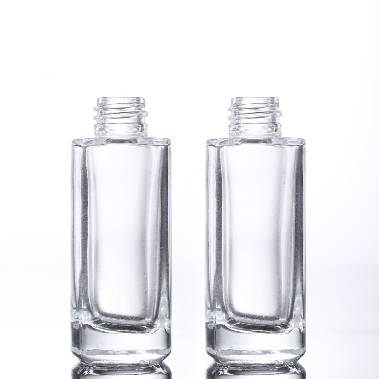 Custom logo 15ml 30ml 50ml clear square dropper bottle with gold and silver personal care production cosmetic package container