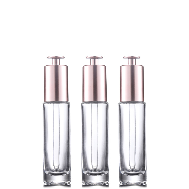 Custom logo 15ml clear glass dropper bottle with gold rose press cap cosmetic package container for essence oil in good price