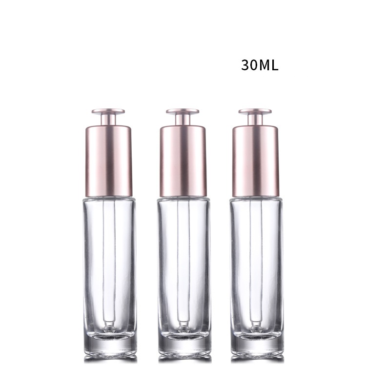 Custom logo 15ml clear glass dropper bottle with gold rose press cap cosmetic package container for essence oil in good price