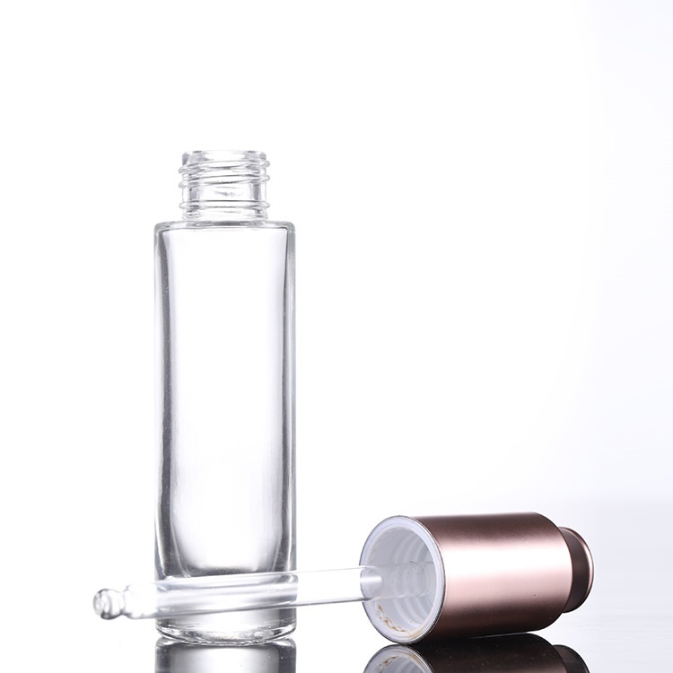 Custom logo 15ml clear glass dropper bottle with gold rose press cap cosmetic package container for essence oil in good price