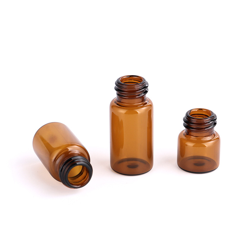 Custom logo 1ml 2ml 3ml amber and clear vial bottle with black and white screw cap for essence oil cosmetic package container