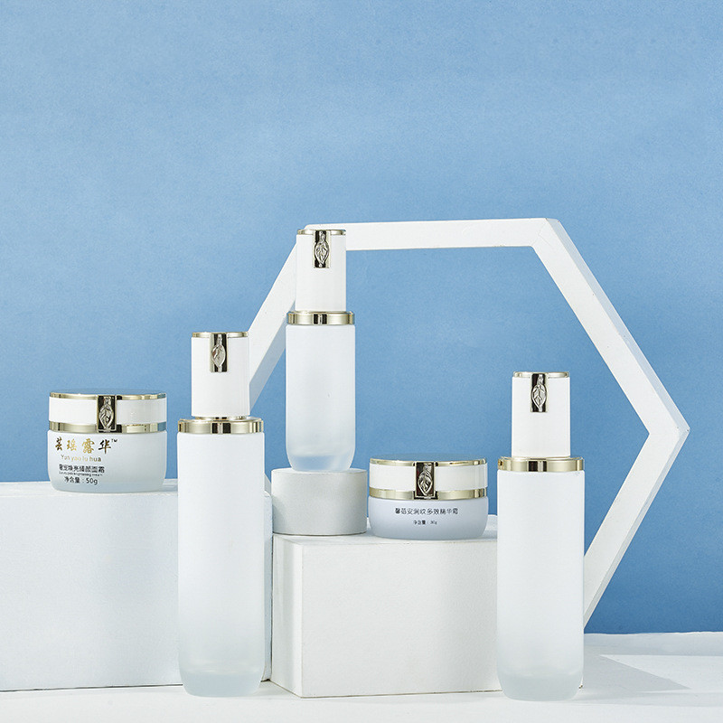 Custom logo 30g 50g 40ml 100ml 120ml white glass bottle with white leaf cap for personal care cosmetic package container