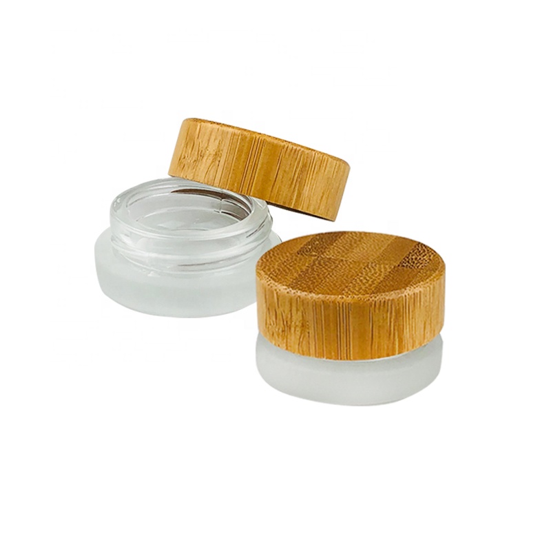 Custom logo 30ml 50ml 100ml frosted glass cosmetic cream jar with bamboo lid wooden cap