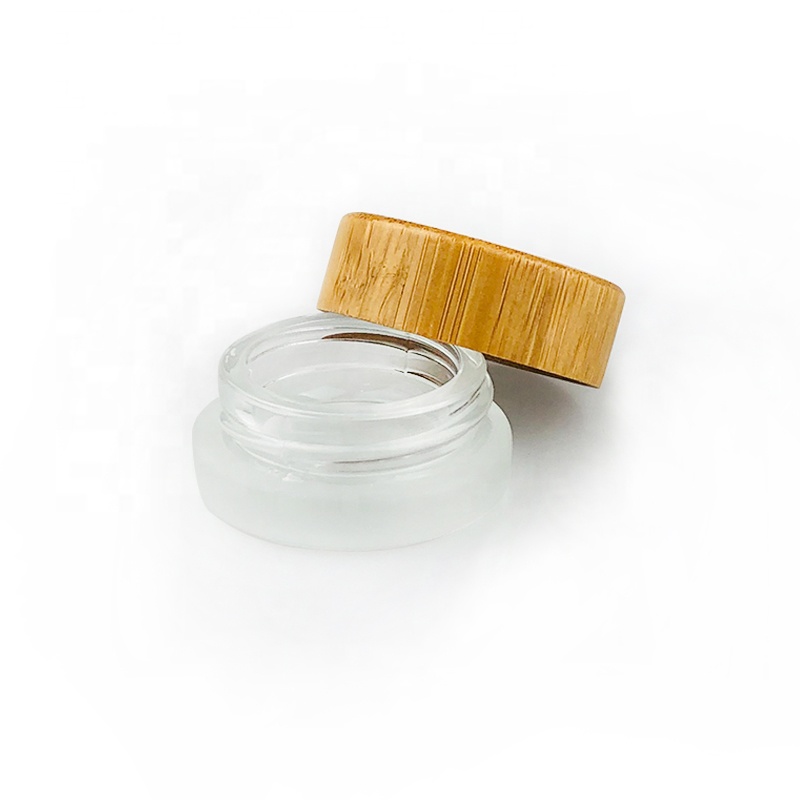 Custom logo 30ml 50ml 100ml frosted glass cosmetic cream jar with bamboo lid wooden cap