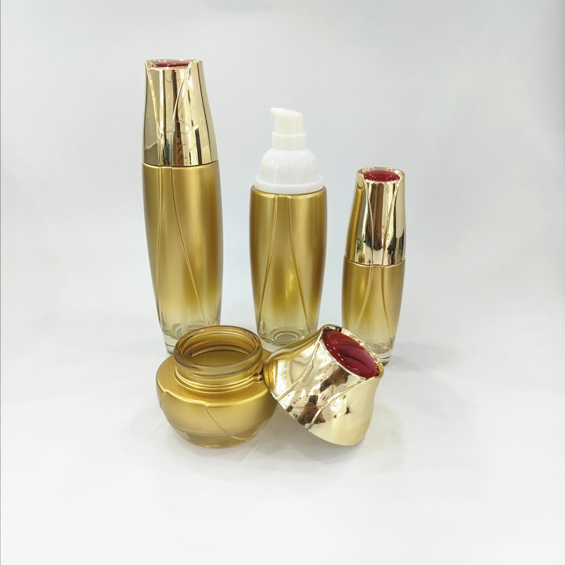 Custom logo 40ml 100ml 120ml 50g flower gold glass bottles with gold cap for personal care cosmetic package container