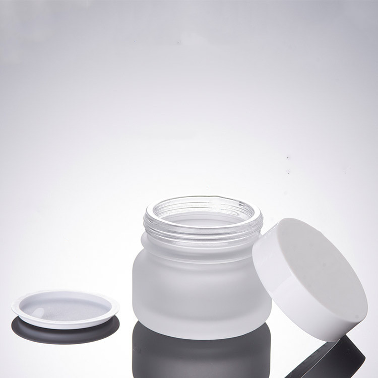 Custom logo 50g 50ml 110ml 150ml frosted white glass bottle and jar for personal care production cosmetic package container