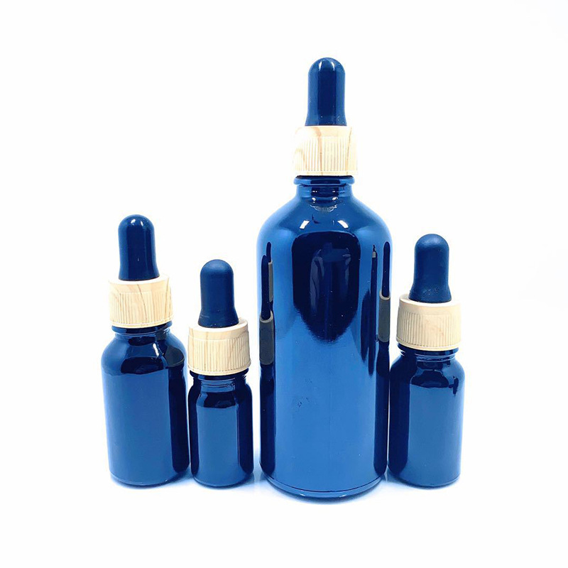 Custom logo 5ml-100ml electroplating blue glass wood grain blue dropper bottle cosmetic package container Essential oil bottle