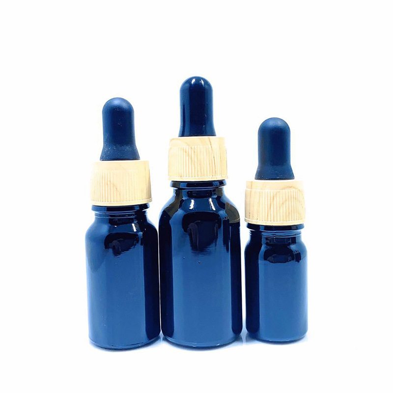 Custom logo 5ml-100ml electroplating blue glass wood grain blue dropper bottle cosmetic package container Essential oil bottle