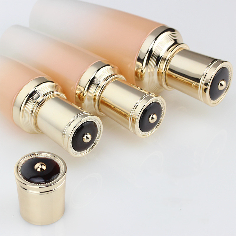 Custom logo Gradient orange Golden Crown Cosmetic Glass Bottle and jar with pearl luster cosmetic package for personal care