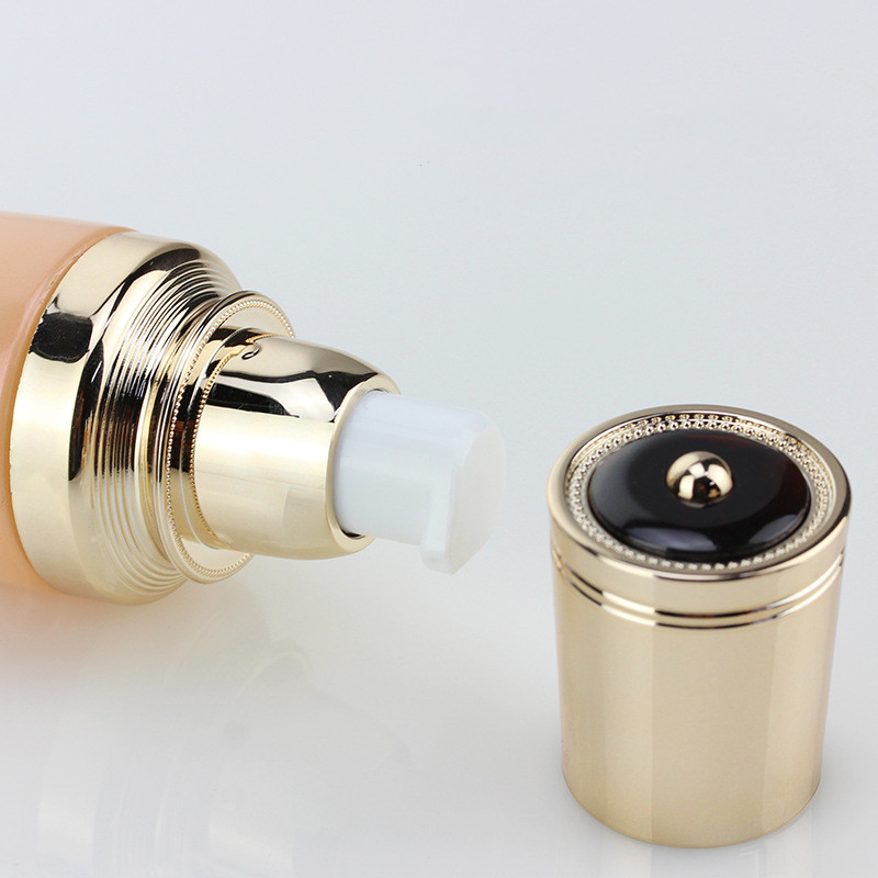 Custom logo Gradient orange Golden Crown Cosmetic Glass Bottle and jar with pearl luster cosmetic package for personal care