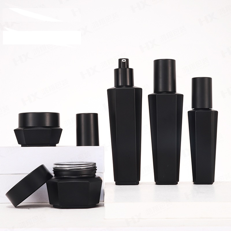 Custom logo black hexagon glass bottle and jar cosmetic package container with black cap for skin care package in good price