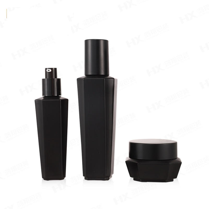 Custom logo black hexagon glass bottle and jar cosmetic package container with black cap for skin care package in good price