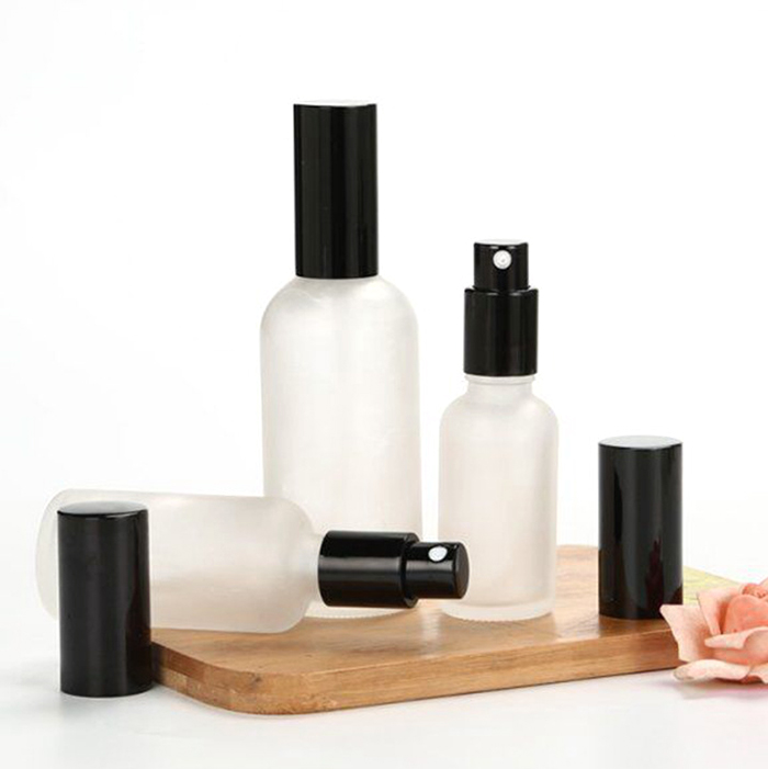 Custom logo cosmetic lotion serum cream serum parfum packaging matt black glass bottle with spray