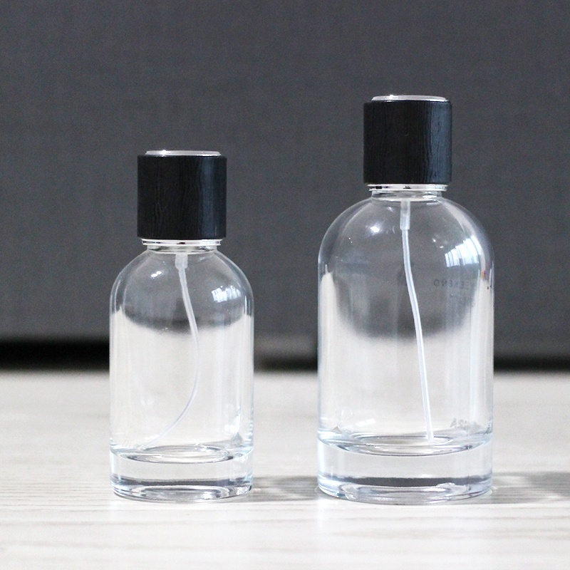 Custom logo cylinder 50ml 100ml empty glass perfume bottles