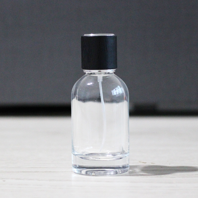 Custom logo cylinder 50ml 100ml empty glass perfume bottles