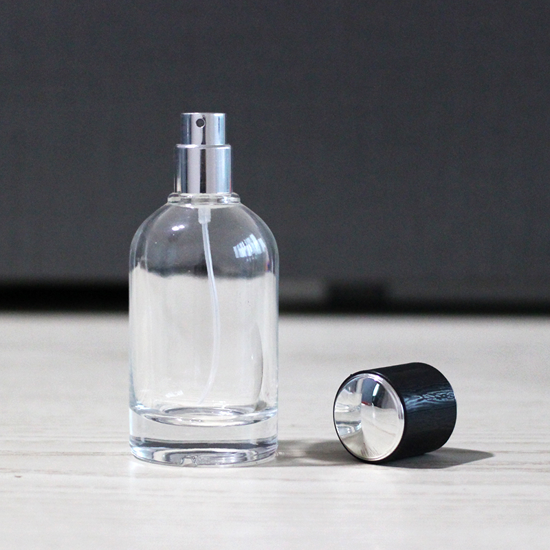 Custom logo cylinder 50ml 100ml empty glass perfume bottles