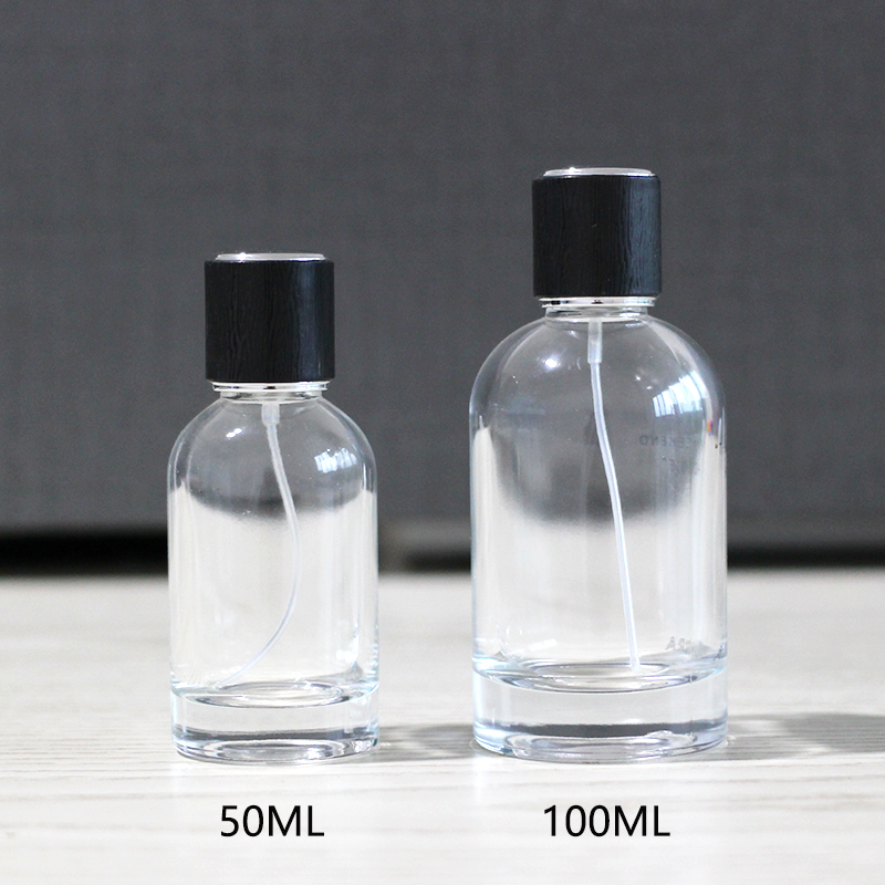 Custom logo cylinder 50ml 100ml empty glass perfume bottles