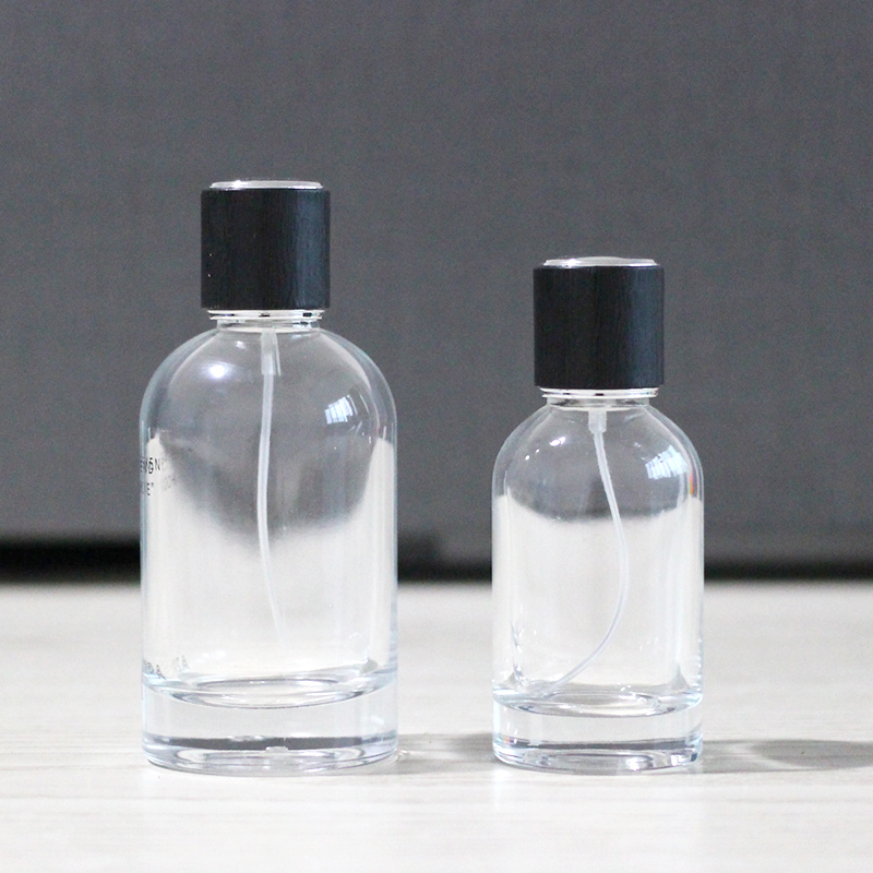 Custom logo cylinder 50ml 100ml empty glass perfume bottles