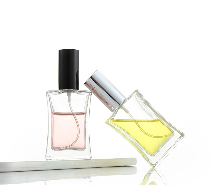 Custom logo free lead 50ml square waist high-end clear glass spray perfume bottle for oil cosmetic package container