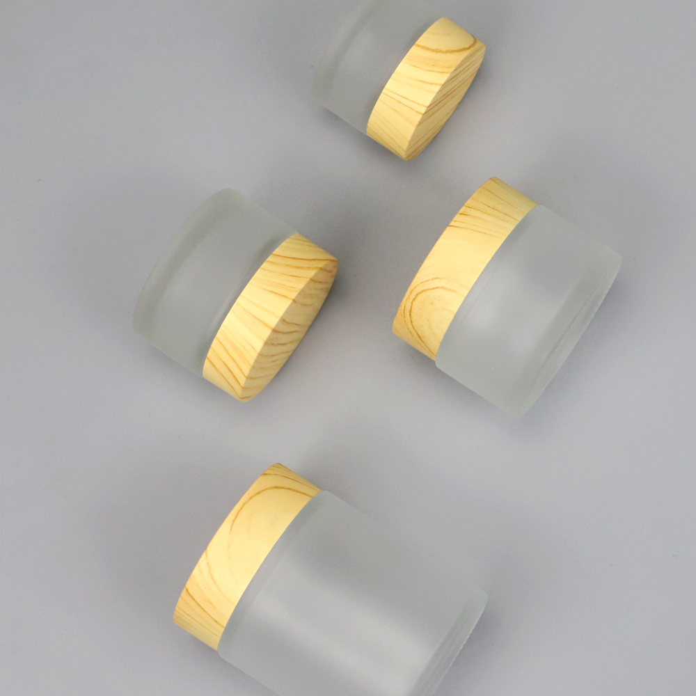 Custom logo glass empty facial cream bottles hand cream bottle with bamboo cap 15g 30g 50g