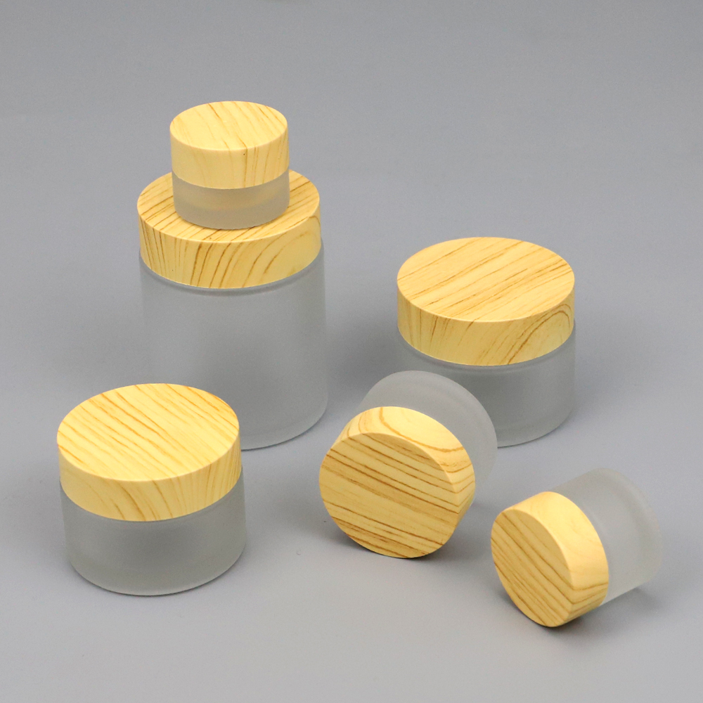 Custom logo glass empty facial cream bottles hand cream bottle with bamboo cap 15g 30g 50g