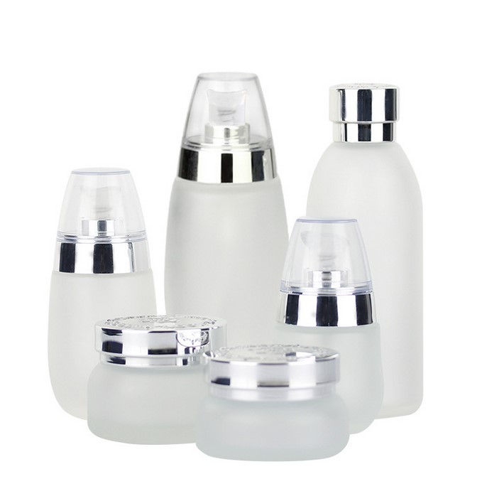 Custom logo golden carved ABS cap 120ml 100ml 50ml 30ml 30g 50g frosted glass bottle and jar cosmetic container package