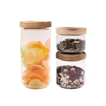 Custom logo high borosilicate heat resistant food safety glass storage jar for spice with bamboo lid