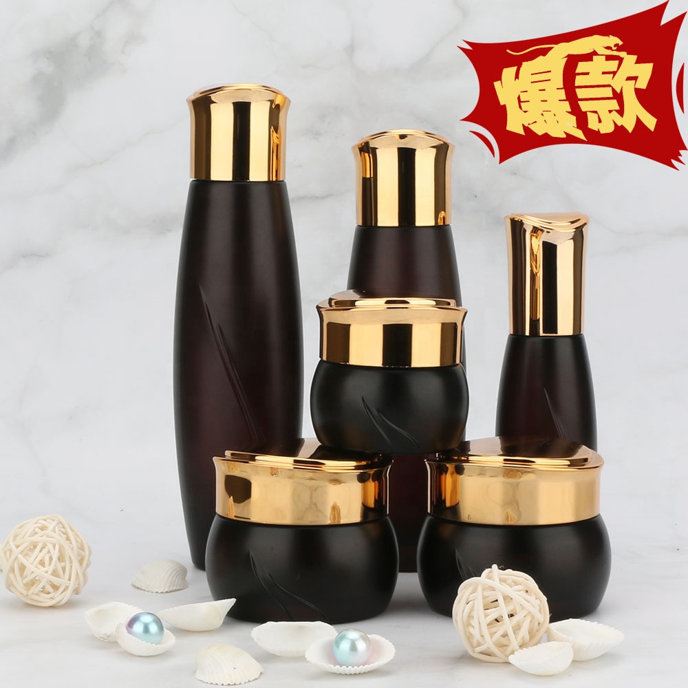 Custom logo high quality black Cosmetic glass bottle with golden caps 30g 50g 40ml 100ml 120ml cosmetic container package
