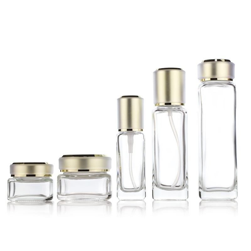 Custom logo luxury 150ml 100ml 40ml 50g 30g square glass bottle and jar cosmetic package with gold cap in good price