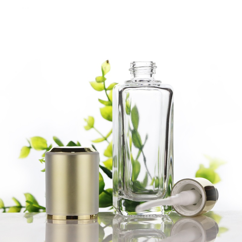 Custom logo luxury 150ml 100ml 40ml 50g 30g square glass bottle and jar cosmetic package with gold cap in good price