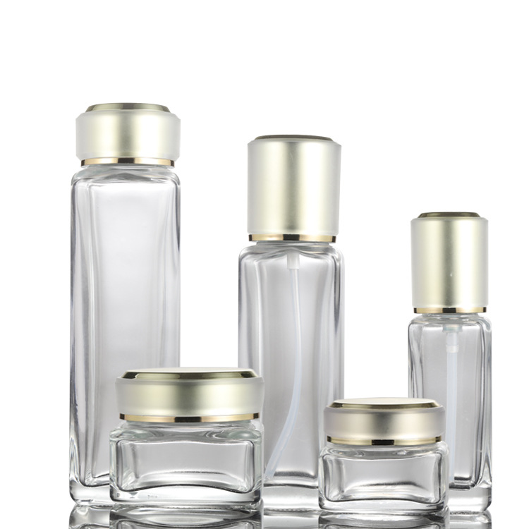 Custom logo luxury 150ml 100ml 40ml 50g 30g square glass bottle and jar cosmetic package with gold cap in good price