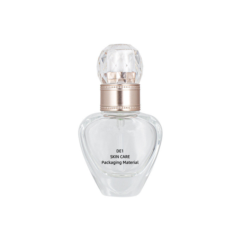 Custom logo luxury 30ml unique shape glass pump bottle cosmetic package for liquid foundation with diamond cap in good price