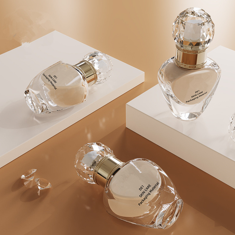 Custom logo luxury 30ml unique shape glass pump bottle cosmetic package for liquid foundation with diamond cap in good price