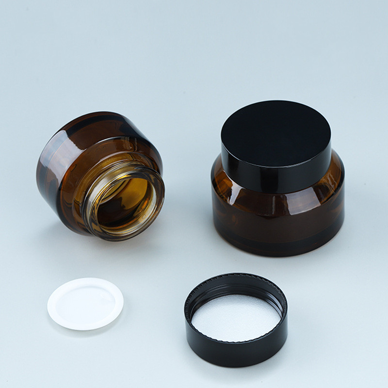 Custom logo small package 15g 30g 50g brown glass jar with black cap for cosmetic facial essence cream in good price