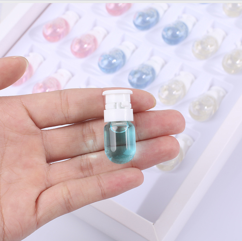 Custom logo small package glass Medical beauty bottle mini vial clear glass sample bottle for cosmetic facial essence oil