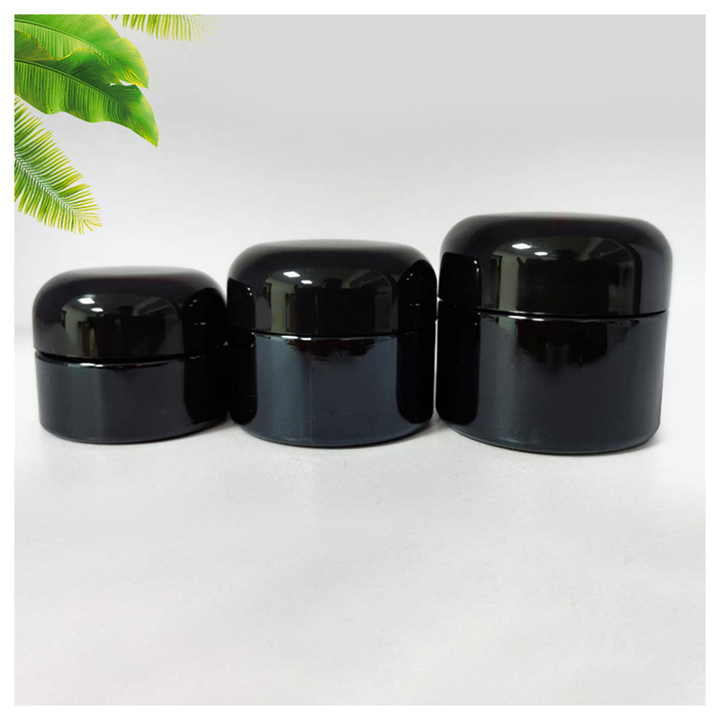 Custom logo total black 20g 30g 50g round shape glass jar with black cap for cosmetic facial essence cream in good price