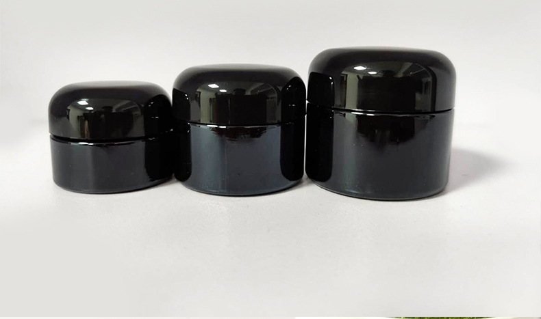 Custom logo total black 20g 30g 50g round shape glass jar with black cap for cosmetic facial essence cream in good price