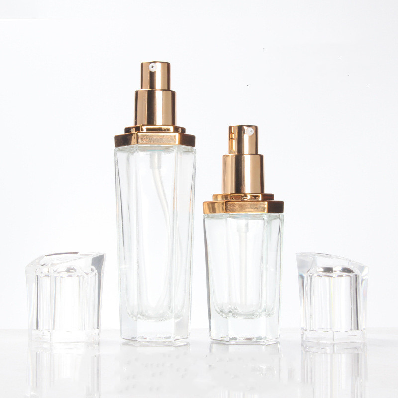 Custom logo transparent glass Hexagonal bottle and jar 30ml 50ml 90ml 110ml 30g 50g for cosmetic package with rose gold flat cap