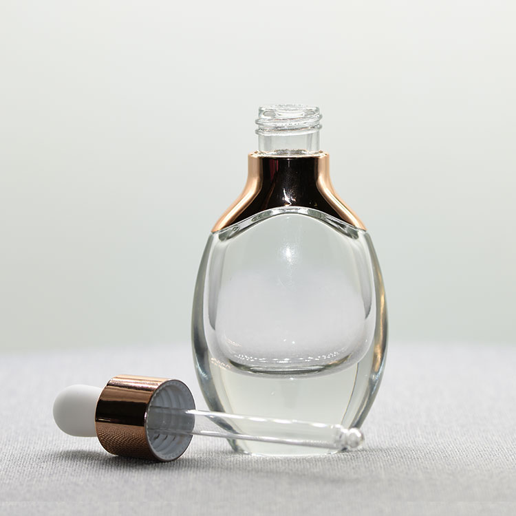 Custom luxury cosmetic packaging aluminum shoulder oval clear white glass Essential Oil dropper Bottle with silver or gold cap