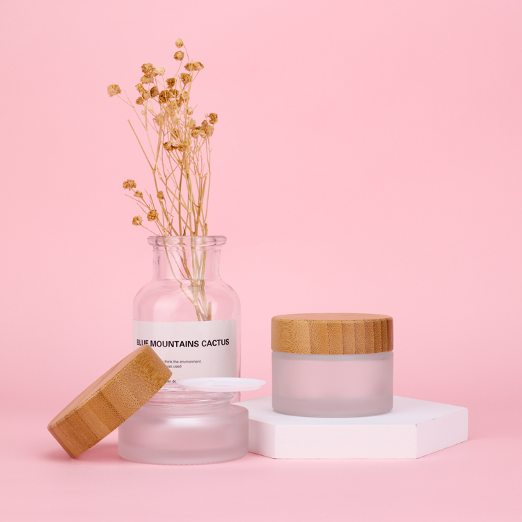 Custom made 20ml 30ml 50ml 1oz 3oz 4oz cream frosted glass jar with bamboo wooden lid for sale