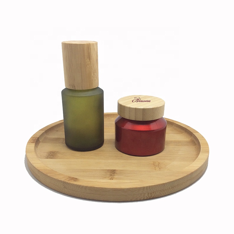 Custom made environment-friendly wooden bamboo glass cosmetic bottles, including tree box packaging, carving customer trademarks