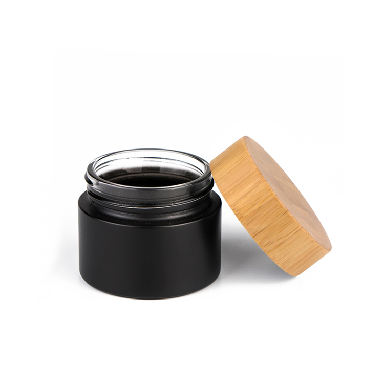Custom made lotion container 30 ml 50 ml 100 ml bamboo cosmetic packaging face cream black glass jars with bamboo wood lid