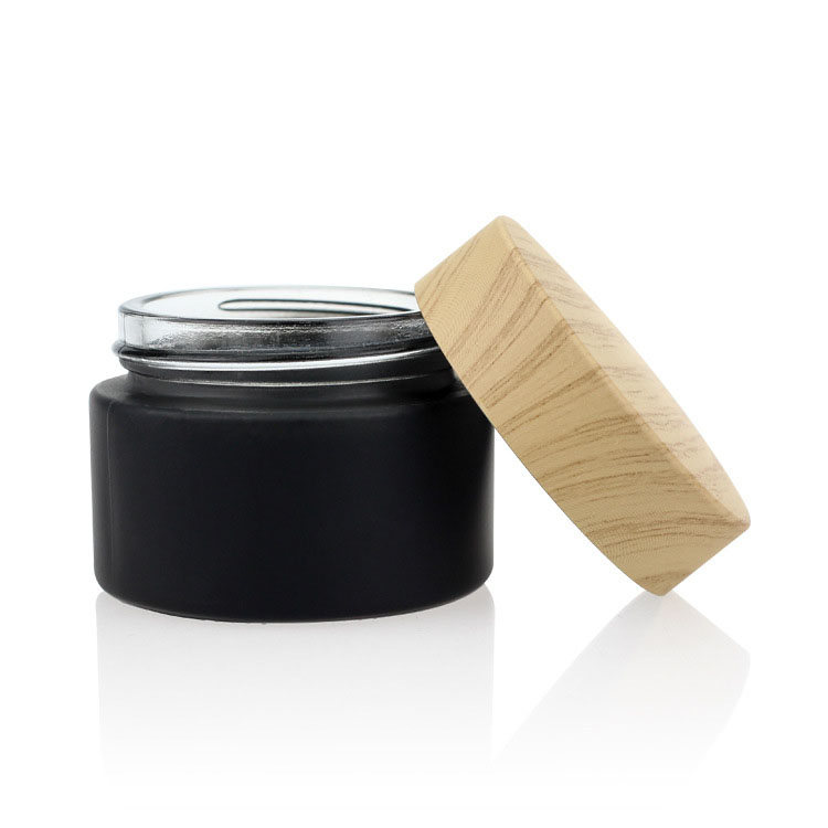 Custom made lotion container 30 ml 50 ml 100 ml bamboo cosmetic packaging face cream black glass jars with bamboo wood lid