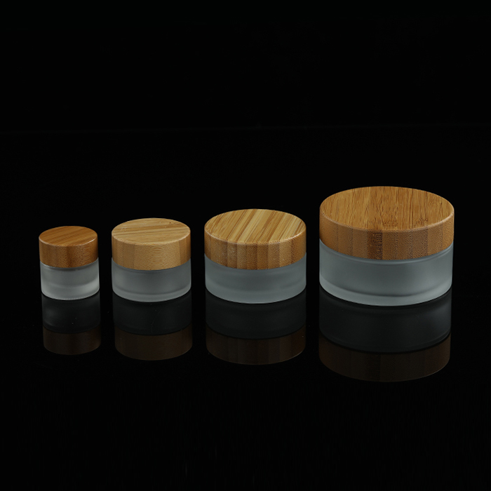 Custom made lotion container 30 ml 50 ml 100 ml bamboo cosmetic packaging face cream frosted glass jars with bamboo wood lid