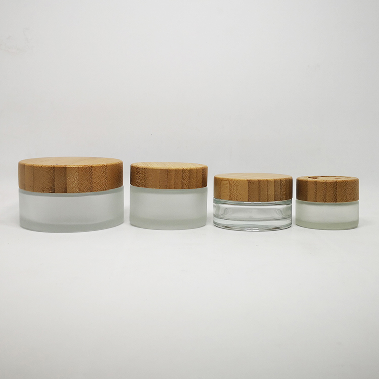 Custom made lotion container 30 ml 50 ml 100 ml bamboo cosmetic packaging face cream frosted glass jars with bamboo wood lid