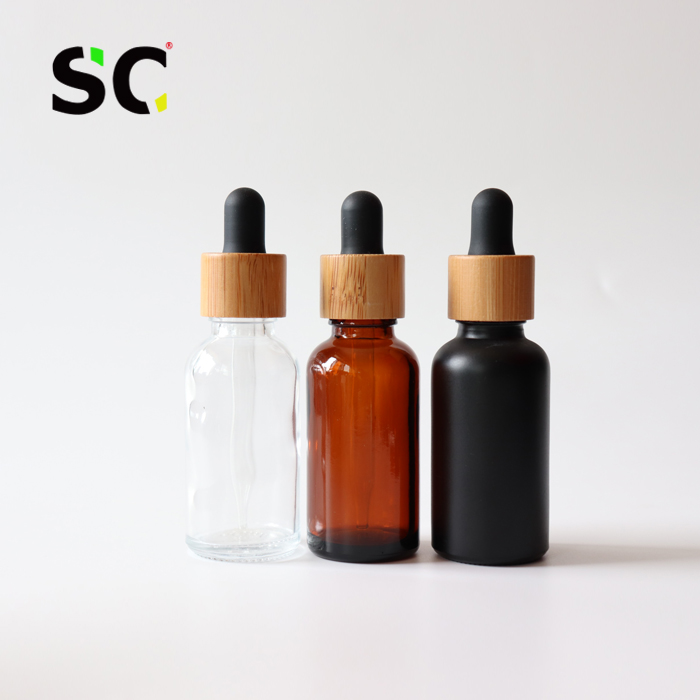 Custom paper cardboard tube 1 ounce clear glass bottles 30ml tincture oil bottles bamboo cap/lid