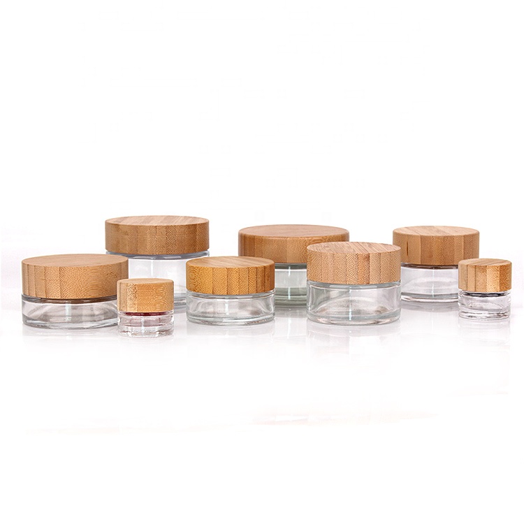 Custom round 10ml 30ml 50ml 100ml clear bamboo lid cosmetic cream packaging glass jar set