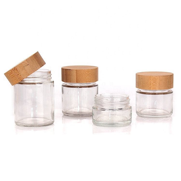 Custom round 10ml 30ml 50ml 100ml clear bamboo lid cosmetic cream packaging glass jar set